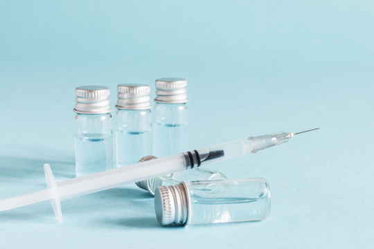 Glass vial and syringe